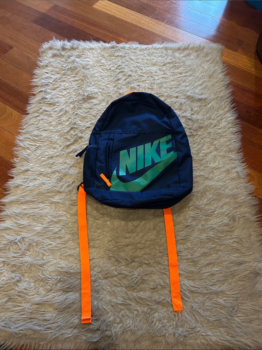 Nike Navy And Teal Kids Backpack with Green Logo and Orange Straps